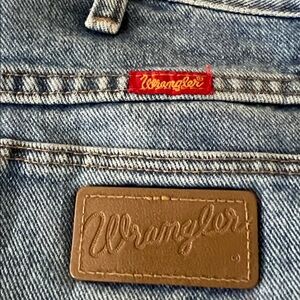 Wrangler Light Blue Denim Boot Cut Jeans with Brown Leather Patch and Red Tag